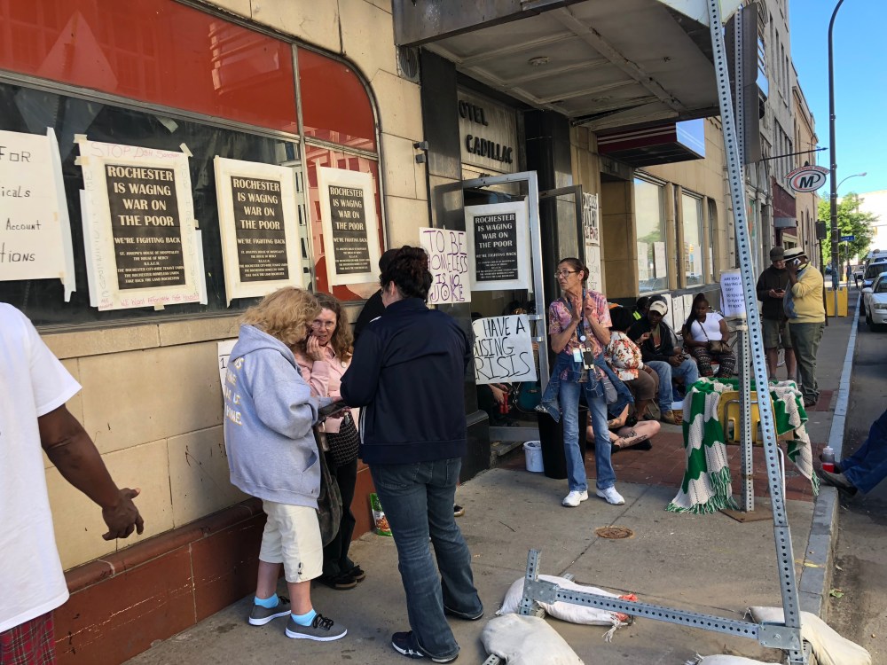 Housing protestors outsdie the Cadiac Hotel